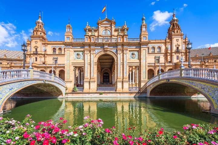 Plaza de Espana buildings and bridges beside a canal in Seville